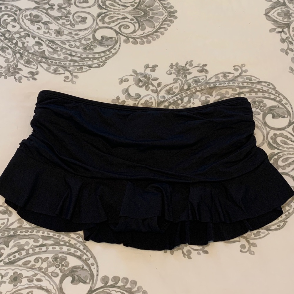 Never worn, tags in swim skirt bottom.